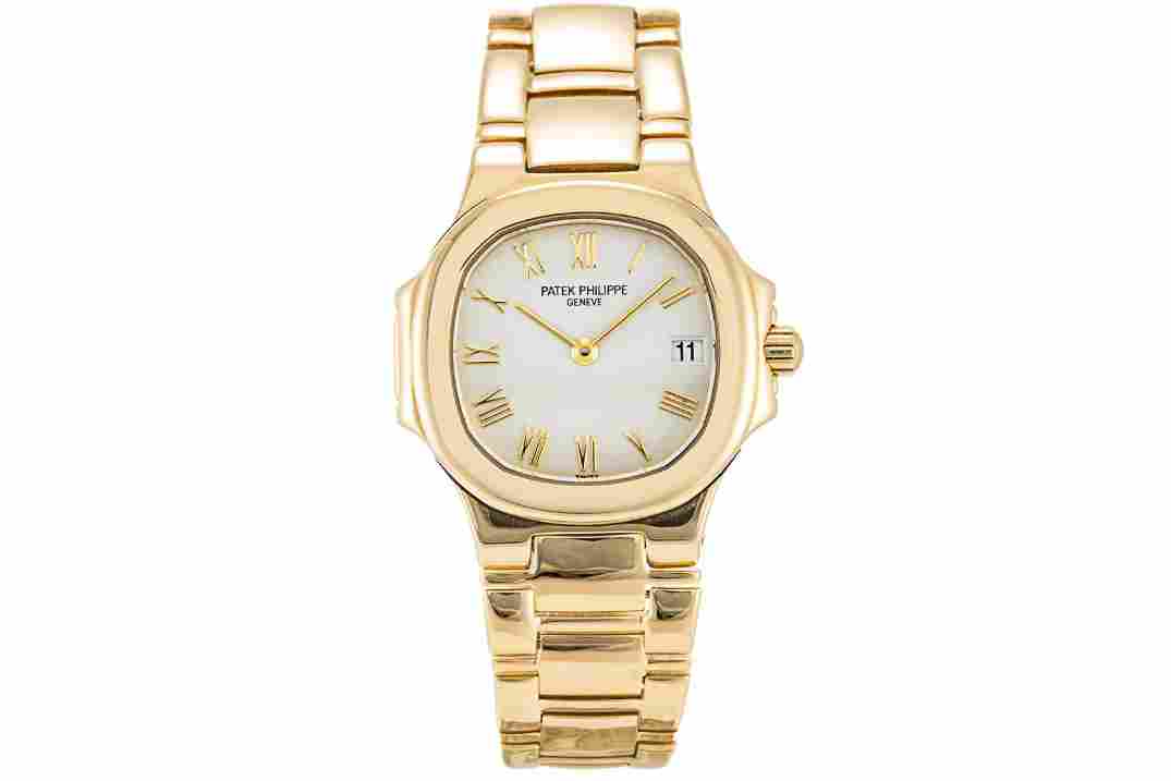 PATEK PHILIPPE NAUTILUS 18K GOLD 25MM LADY REF: 4700/51